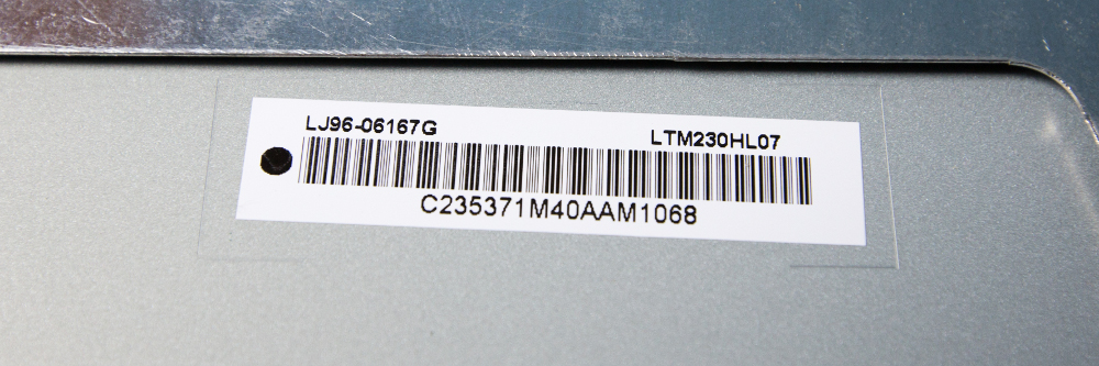 Close-up of the label inside the frame: two barcodes and the panel part number LTM230HL07.
